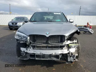 2018 BMW X5 xDrive40e iPerformance with VIN 5UXKT0C57J0V99079, listed as a Copart auction lot 44621905 with 57,556 mi miles and Salvage Title. Bid and sale history available at carsss.com. Image 5.