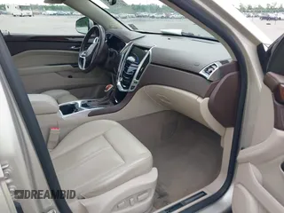 2015 Cadillac SRX Performance Collection with VIN 3GYFNCE34FS639168, listed as a IAAI auction lot 42191995 with 101,358 mi miles and . Bid and sale history available at DreamBid. Image 5.