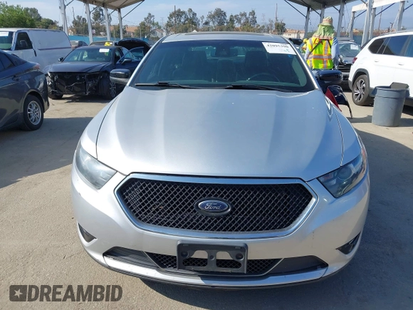 2014 Ford Taurus SHO with VIN 1FAHP2KT8EG123342, listed as a IAAI auction lot 42095390 with 142,957 mi miles. Bid and sale history available at carsss.com. Image 12.