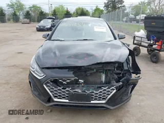 2018 Hyundai Sonata Sport with VIN 5NPE34AF0JH710477, listed as a IAAI auction lot 42104684 with 158,260 mi miles and . Bid and sale history available at carsss.com. Image 13.