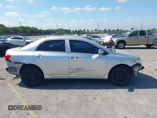 2010 Toyota Corolla with VIN 1NXBU4EE2AZ240438, listed as a IAAI auction lot 42125407 with 185,253 mi miles and . Bid and sale history available at DreamBid. Image 14.