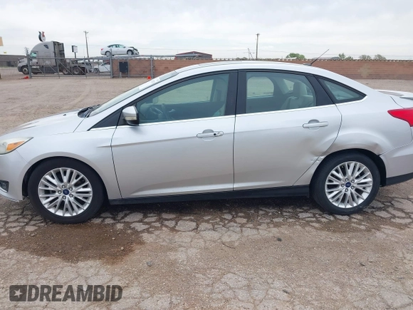 2017 Ford Focus Titanium with VIN 1FADP3J24HL229702, listed as a IAAI auction lot 42057013 with 120,250 mi miles and . Bid and sale history available at DreamBid. Image 14.