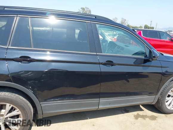 2018 Volkswagen Tiguan S with VIN 3VV1B7AX7JM092033, listed as a IAAI auction lot 42373619 with 124,775 mi miles and . Bid and sale history available at DreamBid. Image 13.