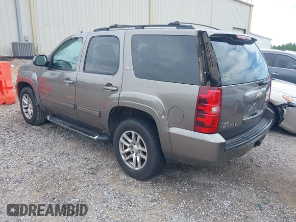 2011 Chevrolet Tahoe LT with VIN 1GNSCBE08BR163408, listed as a IAAI auction lot 42345398 with 283,718 mi miles and . Bid and sale history available at DreamBid. Image 3.