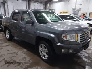 2014 Honda Ridgeline RTL z VIN 5FPYK1F58EB501255, wystawiony jako IAAI lot #41691804 z przebiegiem 114 515 mil mil oraz . Historia ofert i sprzedaży dostępna na DreamBid. Obrazek 1.