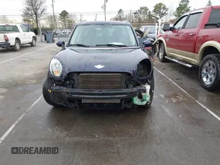 2013 MINI Countryman S ALL4 z VIN WMWZC5C51DWM15816, wystawiony jako IAAI lot #41734311 z przebiegiem 134 636 mil mil oraz . Historia ofert i sprzedaży dostępna na DreamBid. Obrazek 6.