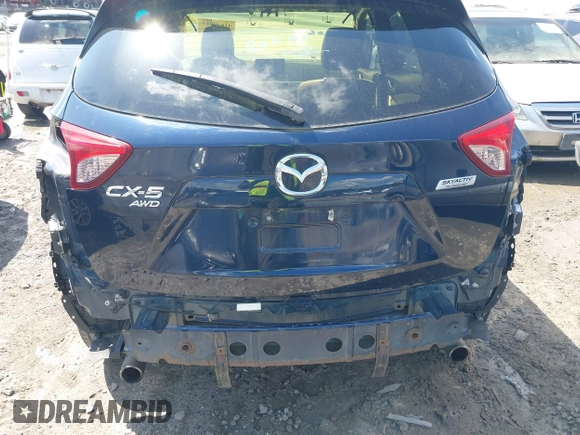 2016 Mazda CX-5 Touring with VIN JM3KE4CY0G0916908, listed as a IAAI auction lot 41848823 with 53,255 mi miles. Bid and sale history available at carsss.com. Image 16.