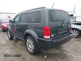 2010 Dodge Nitro Heat with VIN 1D4PT4GK3AW173744, listed as a IAAI auction lot 40414840 with 124,221 mi miles and . Bid and sale history available at DreamBid. Image 3.