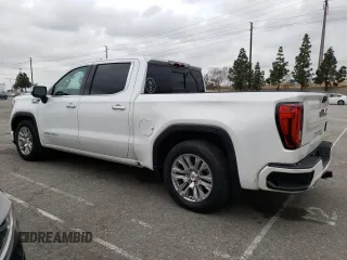 2022 GMC Sierra 1500 with VIN 3GTUUGETXNG640009, listed as a Copart auction lot 56219405 with 43,537 mi miles and Salvage Title. Bid and sale history available at DreamBid. Image 2.