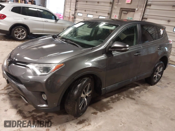 2018 Toyota RAV4 XLE with VIN 2T3RFREVXJW788412, listed as a IAAI auction lot 41931142 with 119,962 mi miles. Bid and sale history available at carsss.com. Image 17.