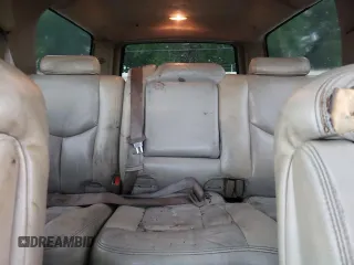 2004 GMC Yukon XL SLT with VIN 1GKEC16Z34J292613, listed as a Copart auction lot 54796584 with 237,445 mi miles and Salvage Title. Bid and sale history available at carsss.com. Image 10.