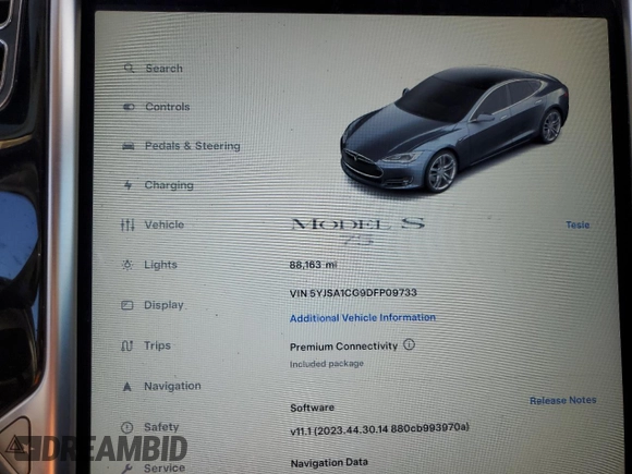 2013 Tesla Model S with VIN 5YJSA1CG9DFP09733, listed as a Copart auction lot 87739005 with 88,163 mi miles and Salvage title. Bid and sale history available at DreamBid. Image 9.