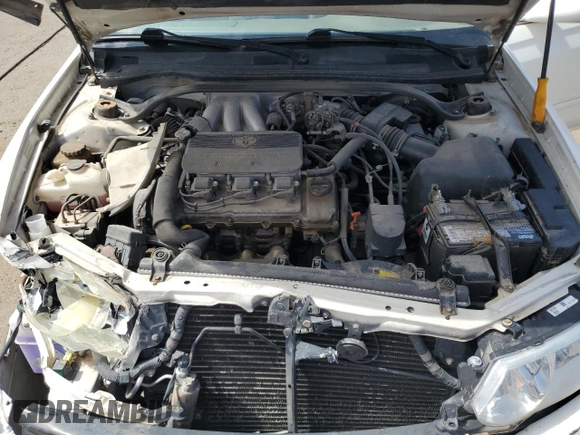 2002 Toyota Solara SE with VIN 2T1CF28P82C601593, listed as a Copart auction lot 60487005 with 137,624 mi miles and Salvage title. Bid and sale history available at DreamBid. Image 11.