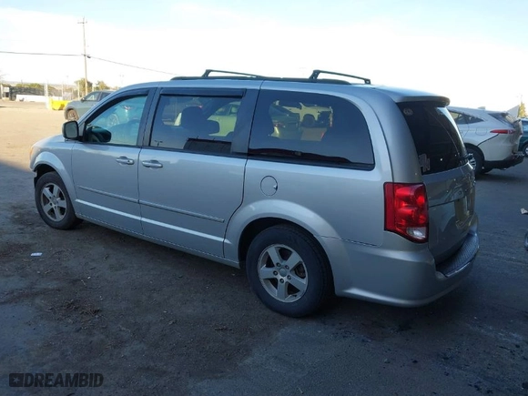 2012 Dodge Grand Caravan SXT with VIN 2C4RDGCG8CR296361, listed as a IAAI auction lot 41657743 with 205,531 mi miles. Bid and sale history available at carsss.com. Image 3.