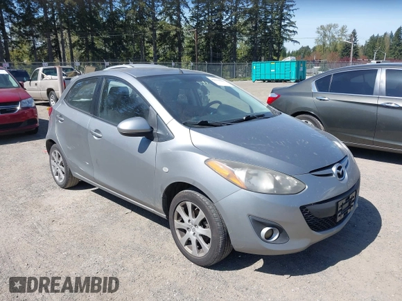 2013 Mazda 2 Touring z VIN JM1DE1LY5D0160410, wystawiony jako IAAI lot #42034986 z przebiegiem 124 791 mil mil oraz . Historia ofert i sprzedaży dostępna na DreamBid. Obrazek 1.