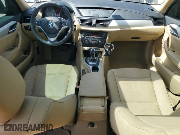 2013 BMW X1 28i z VIN WBAVM1C59DVW41709, wystawiony jako Copart lot #57316485 z przebiegiem 115 563 mil mil oraz Tytuł czysty. Historia ofert i sprzedaży dostępna na DreamBid. Obrazek 8.