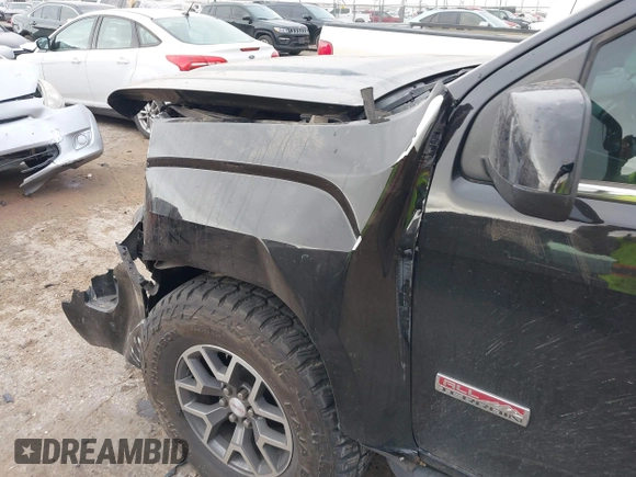 2015 GMC Canyon 4WD SLE with VIN 1GTG6BE39F1196261, listed as a IAAI auction lot 41703057 with 116,215 mi miles and . Bid and sale history available at carsss.com. Image 6.