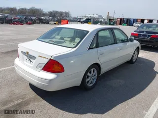 2001 Toyota Avalon XL w/Bucket Seats with VIN 4T1BF28B61U169213, listed as a IAAI auction lot 41829245 with 99,940 mi miles. Bid and sale history available at carsss.com. Image 4.