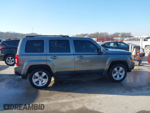 2011 Jeep Patriot Sport with VIN 1J4NT1GA1BD220156, listed as a IAAI auction lot 41760424 with 100,336 mi miles and . Bid and sale history available at carsss.com. Image 14.