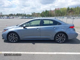 2021 Toyota Corolla SE with VIN JTDS4MCE0MJ077656, listed as a IAAI auction lot 42162598 with 32,714 mi miles and . Bid and sale history available at carsss.com. Image 14.