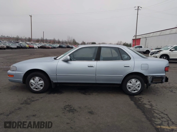 1994 Toyota Camry LE with VIN JT2SK12E2R0207688, listed as a IAAI auction lot 41323827 with 162,680 mi miles. Bid and sale history available at carsss.com. Image 14.