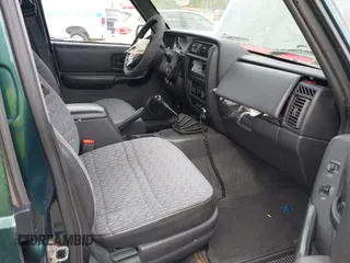 1999 Jeep Cherokee Sport with VIN 1J4FF68S1XL555463, listed as a IAAI auction lot 41898076 with 206,656 mi miles. Bid and sale history available at carsss.com. Image 5.