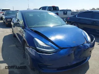 2018 Tesla Model 3 Long Range Battery with VIN 5YJ3E1EA1JF014630, listed as a IAAI auction lot 41877296 with 137,294 mi miles and . Bid and sale history available at DreamBid. Image 1.