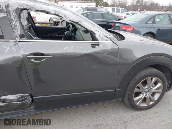 2022 Mazda CX-30 S Premium with VIN 3MVDMBDL9NM434619, listed as a IAAI auction lot 41620655 with 46,557 mi miles and . Bid and sale history available at carsss.com. Image 17.