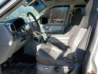 2004 Ford Expedition XLT with VIN 1FMFU16W24LA90624, listed as a Copart auction lot 52452175 with 215,224 mi miles and Clean Title. Bid and sale history available at carsss.com. Image 7.