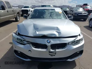 2015 BMW 4 Series 428i with VIN WBA3N7C54FK225045, listed as a IAAI auction lot 42042980 with 72,909 mi miles. Bid and sale history available at carsss.com. Image 6.