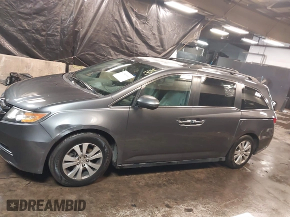2016 Honda Odyssey EX-L with VIN 5FNRL5H61GB138100, listed as a IAAI auction lot 41548666 with 127,780 mi miles. Bid and sale history available at carsss.com. Image 14.