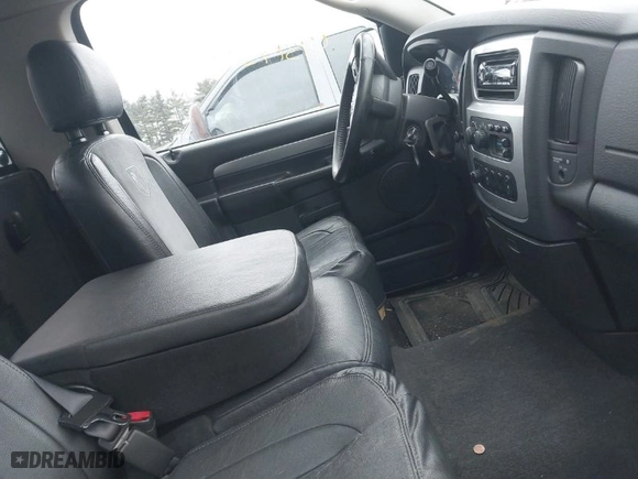 2005 Dodge Ram 1500 SLT with VIN 1D7HU16DX5J597138, listed as a IAAI auction lot 41319558 with 138,671 mi miles. Bid and sale history available at carsss.com. Image 5.