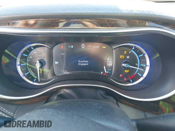 2023 Chrysler Pacifica Hybrid Limited with VIN 2C4RC1S7XPR518695, listed as a IAAI auction lot 41301401 with 24,433 mi miles and . Bid and sale history available at DreamBid. Image 7.