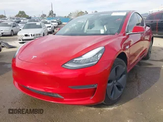 2020 Tesla Model 3 Standard Range Plus with VIN 5YJ3E1EA9LF718027, listed as a IAAI auction lot 41679320 with 68,987 mi miles. Bid and sale history available at carsss.com. Image 17.