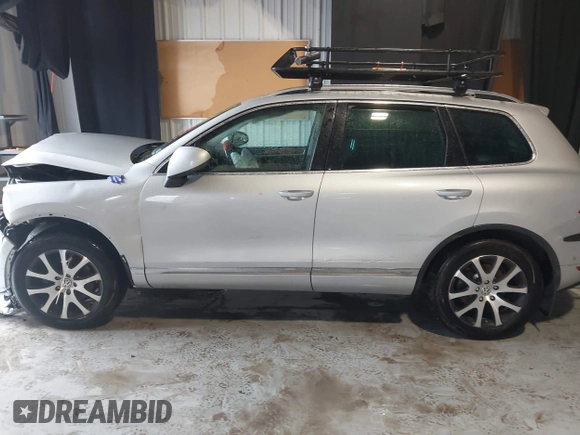 2011 Volkswagen Touareg Exec with VIN WVGFK9BP4BD005986, listed as a IAAI auction lot 41183877 with 109,005 mi miles and . Bid and sale history available at DreamBid. Image 14.