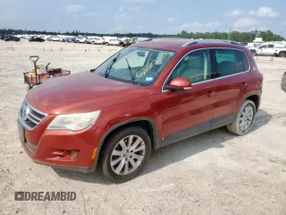 2011 Volkswagen Tiguan SEL w/Premium Navi z VIN WVGAV7AX9BW001847, wystawiony jako Copart lot #57580235 z przebiegiem 131 535 mil mil oraz Czysty tytuł • Clean title. Historia ofert i sprzedaży dostępna na DreamBid. Obrazek 1.