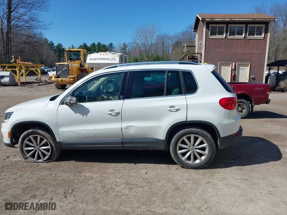 2017 Volkswagen Tiguan Wolfsburg Edition with VIN WVGSV7AX8HK001374, listed as a IAAI auction lot 42070567 with 75,834 mi miles. Bid and sale history available at carsss.com. Image 13.