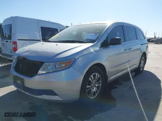 2013 Honda Odyssey EX-L with VIN 5FNRL5H65DB046726, listed as a IAAI auction lot 41763685 with 140,476 mi miles. Bid and sale history available at carsss.com. Image 2.