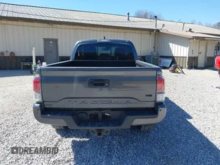 2023 Toyota Tacoma SR5 z VIN 3TMDZ5BN1PM163714, wystawiony jako IAAI lot #41814446 z przebiegiem 14 069 mil mil oraz . Historia ofert i sprzedaży dostępna na DreamBid. Obrazek 17.