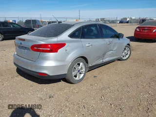 2017 Ford Focus SE with VIN 1FADP3F29HL263353, listed as a IAAI auction lot 41945763 with 116,866 mi miles and . Bid and sale history available at DreamBid. Image 4.
