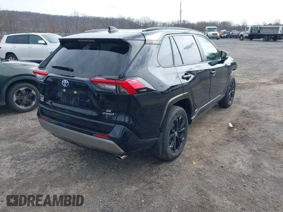 2024 Toyota RAV4 Hybrid SE with VIN JTM16RFV0RD118873, listed as a IAAI auction lot 42039019 with 7,532 mi miles and . Bid and sale history available at DreamBid. Image 4.