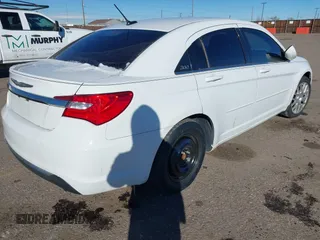 2012 Chrysler 200 LX with VIN 1C3CCBAB4CN317548, listed as a IAAI auction lot 41215213 with 140,497 mi miles. Bid and sale history available at carsss.com. Image 4.