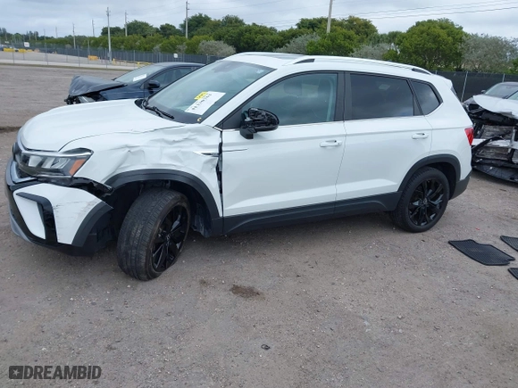 2023 Volkswagen Taos SE with VIN 3VVEX7B27PM300636, listed as a IAAI auction lot 41330763 with 18,630 mi miles. Bid and sale history available at carsss.com. Image 17.