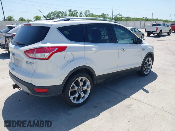 2013 Ford Escape Titanium with VIN 1FMCU0J9XDUA33872, listed as a IAAI auction lot 42009286 with 161,677 mi miles. Bid and sale history available at carsss.com. Image 4.