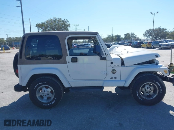 2001 Jeep Wrangler Sahara with VIN 1J4FA59S51P332107, listed as a IAAI auction lot 40954726 with 150,671 mi miles. Bid and sale history available at carsss.com. Image 13.