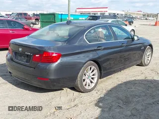 2014 BMW 5 Series 535d with VIN WBAXA5C52ED689245, listed as a IAAI auction lot 41016152 with 95,392 mi miles and . Bid and sale history available at carsss.com. Image 4.