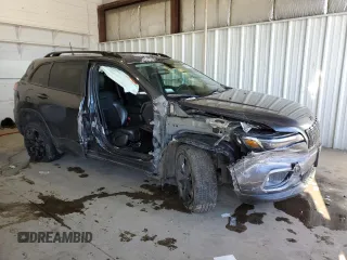 2021 Jeep Cherokee Altitude with VIN 1C4PJLLB2MD187590, listed as a Copart auction lot 88311945 with 49,253 mi miles and Salvage Title. Bid and sale history available at carsss.com. Image 4.