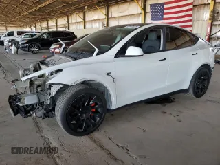 2021 Tesla Model Y Long Range z VIN 5YJYGDEE2MF243858, wystawiony jako Copart lot #58043055 z przebiegiem 24 128 mil mil oraz Szkoda całkowita • Salvage title. Historia ofert i sprzedaży dostępna na DreamBid. Obrazek 1.