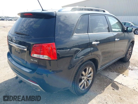 2012 Kia Sorento SX with VIN 5XYKW4A29CG261253, listed as a IAAI auction lot 41575721 with 161,477 mi miles. Bid and sale history available at carsss.com. Image 4.