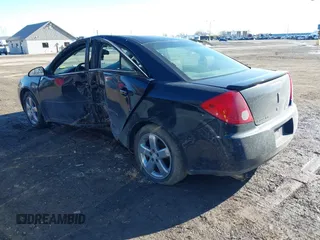 2005 Pontiac G6 GT with VIN 1G2ZH528354169479, listed as a IAAI auction lot 41430508 with 241,576 mi miles. Bid and sale history available at carsss.com. Image 3.